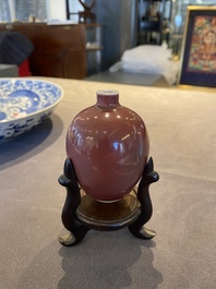 A small Chinese monochrome copper-red-glazed vase, Xuande mark, 19th C.