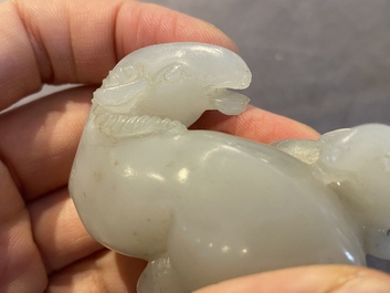 A Chinese white jade 'two rams' group, 19th C.
