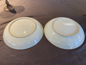 A pair of Chinese iron-red and grisaille 'boy on buffalo' plates, Qianlong