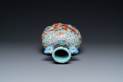 A Chinese famille rose vase with molded design of Buddhist lions, Qianlong mark, 19th C.