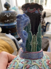 A Chinese famille rose vase with molded design of Buddhist lions, Qianlong mark, 19th C.