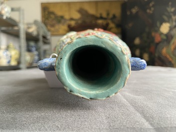 A Chinese famille rose vase with molded design of Buddhist lions, Qianlong mark, 19th C.