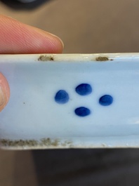 A pair of Chinese blue and white 'herring' dishes, Qianlong