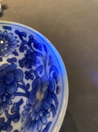 Een paar Chinese blauw-witte stem cups met floraal decor, Kangxi
