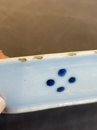 A pair of Chinese blue and white 'herring' dishes, Qianlong