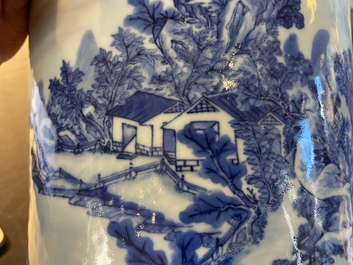 A Chinese blue and white brush pot with a refined landscape, 19th C.