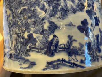 A Chinese blue and white brush pot with a refined landscape, 19th C.