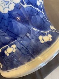 A Chinese blue and white 'prunus on cracked ice' vase and cover, Kangxi
