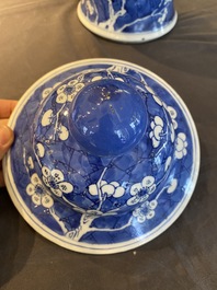 A Chinese blue and white 'prunus on cracked ice' vase and cover, Kangxi