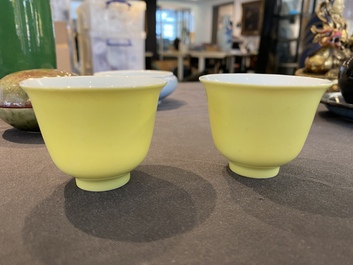 A pair of Chinese yellow-glazed wine cups, Guangxu mark, 20th C.