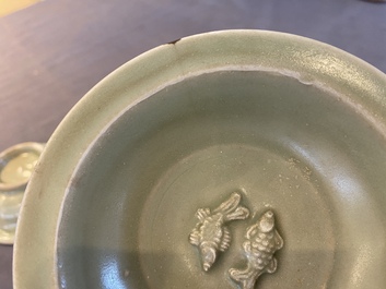Two Chinese celadon-glazed bowls, one with twin fish, Ming