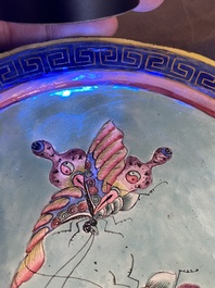 A Chinese Canton enamel hand mirror, inscribed 'Dan Na', Qianlong