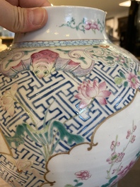 A pair of fine Chinese famille rose vases and covers, Qianlong mark, 19th C.