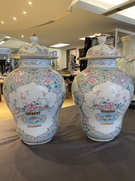 A pair of fine Chinese famille rose vases and covers, Qianlong mark, 19th C.