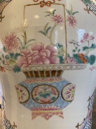 A pair of fine Chinese famille rose vases and covers, Qianlong mark, 19th C.