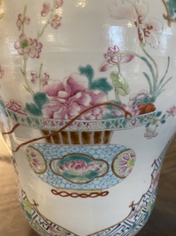 A pair of fine Chinese famille rose vases and covers, Qianlong mark, 19th C.
