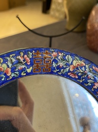 A Chinese Canton enamel hand mirror, inscribed 'Dan Na', Qianlong