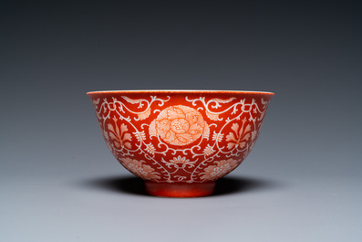 A Chinese coral-ground reserve-decorated 'lotus' bowl, Jiaqing mark, 19/20th C.