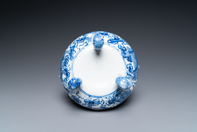 A Chinese blue and white 'mythical beasts' tripod censer, 19th C.