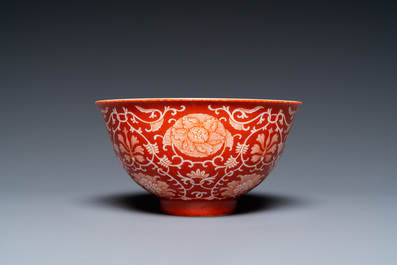 A Chinese coral-ground reserve-decorated 'lotus' bowl, Jiaqing mark, 19/20th C.