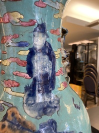 A Chinese famille rose turquoise-ground 'immortals' vase, 19th C.