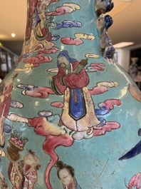 A Chinese famille rose turquoise-ground 'immortals' vase, 19th C.