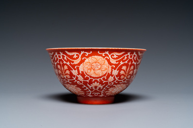 A Chinese coral-ground reserve-decorated 'lotus' bowl, Jiaqing mark, 19/20th C.