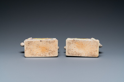 A pair of Chinese famille rose elephants on stands, 20th C.