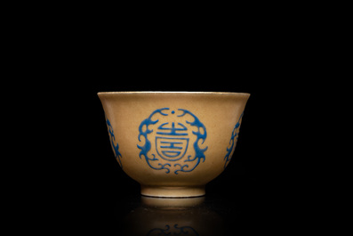 A Chinese blue enamel on gilt &lsquo;Shou&rsquo; tea bowl, 18/19th C.
