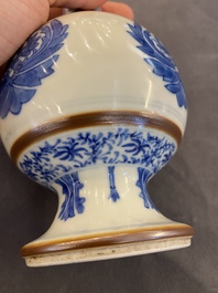 A pair of Chinese blue and white 'Baoxiang' sprinklers, Kangxi
