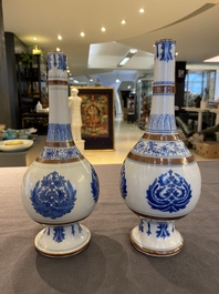A pair of Chinese blue and white 'Baoxiang' sprinklers, Kangxi