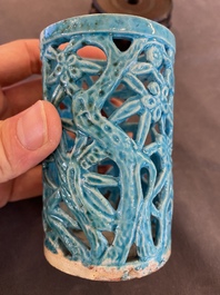 A Chinese reticulated monochrome turquoise brush pot on wooden stand, Qing