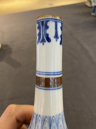 A pair of Chinese blue and white 'Baoxiang' sprinklers, Kangxi