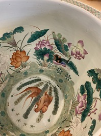 A large Chinese famille verte light blue-ground fish bowl, 19th C.
