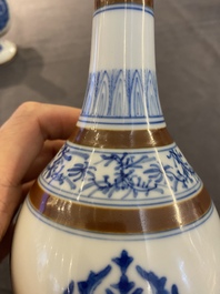 A pair of Chinese blue and white 'Baoxiang' sprinklers, Kangxi