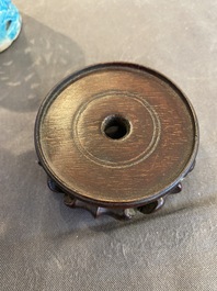 A Chinese reticulated monochrome turquoise brush pot on wooden stand, Qing