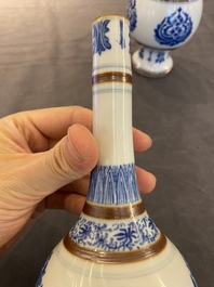 A pair of Chinese blue and white 'Baoxiang' sprinklers, Kangxi