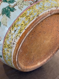 A large Chinese famille verte light blue-ground fish bowl, 19th C.