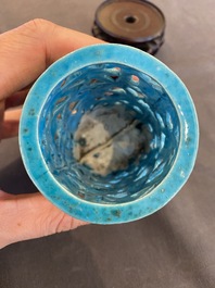 A Chinese reticulated monochrome turquoise brush pot on wooden stand, Qing