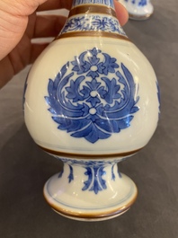 A pair of Chinese blue and white 'Baoxiang' sprinklers, Kangxi