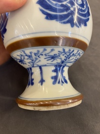 A pair of Chinese blue and white 'Baoxiang' sprinklers, Kangxi