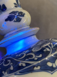 A Chinese blue and white rouleau vase with antiquities, Kangxi