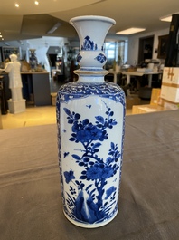 A Chinese blue and white rouleau vase with antiquities, Kangxi
