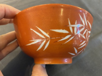 A Chinese coral-ground reserve-decorated 'bamboo' bowl, Xuantong mark, 20th C.