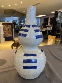 A Chinese blue and white crackle-glazed double gourd 'trigrams' vase, probably  Ming