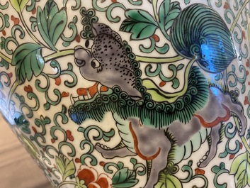 A pair of Chinese famille verte 'Buddhist lions' vases, 19th C.