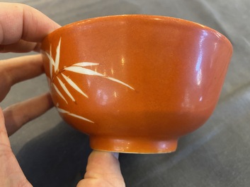 A Chinese coral-ground reserve-decorated 'bamboo' bowl, Xuantong mark, 20th C.