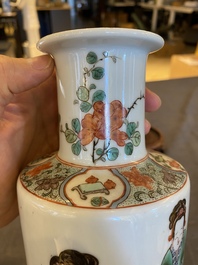 A Chinese famille verte rouleau vase on wooden 'lotus' stand, probably 19th C.