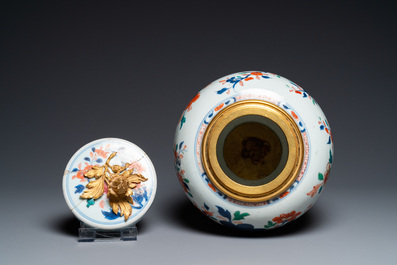 A Chinese rose-Imari jar and cover with gilt bronze mount, Qianlong