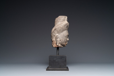 A stone head of Avalokitesvara, Khmer, Cambodia